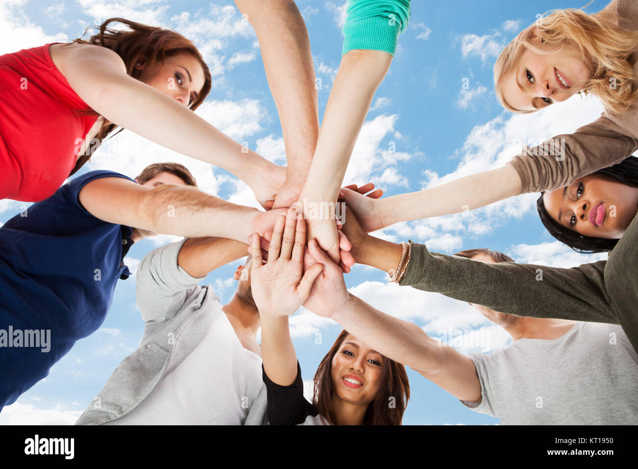 Young College Students Stacking Hands Stock Photo Alamy