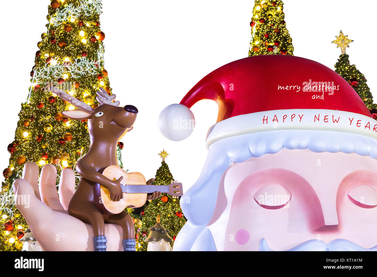 merry christmas and happy new year with santa claus and reindeer and lighting christmas tree Stock Photo
