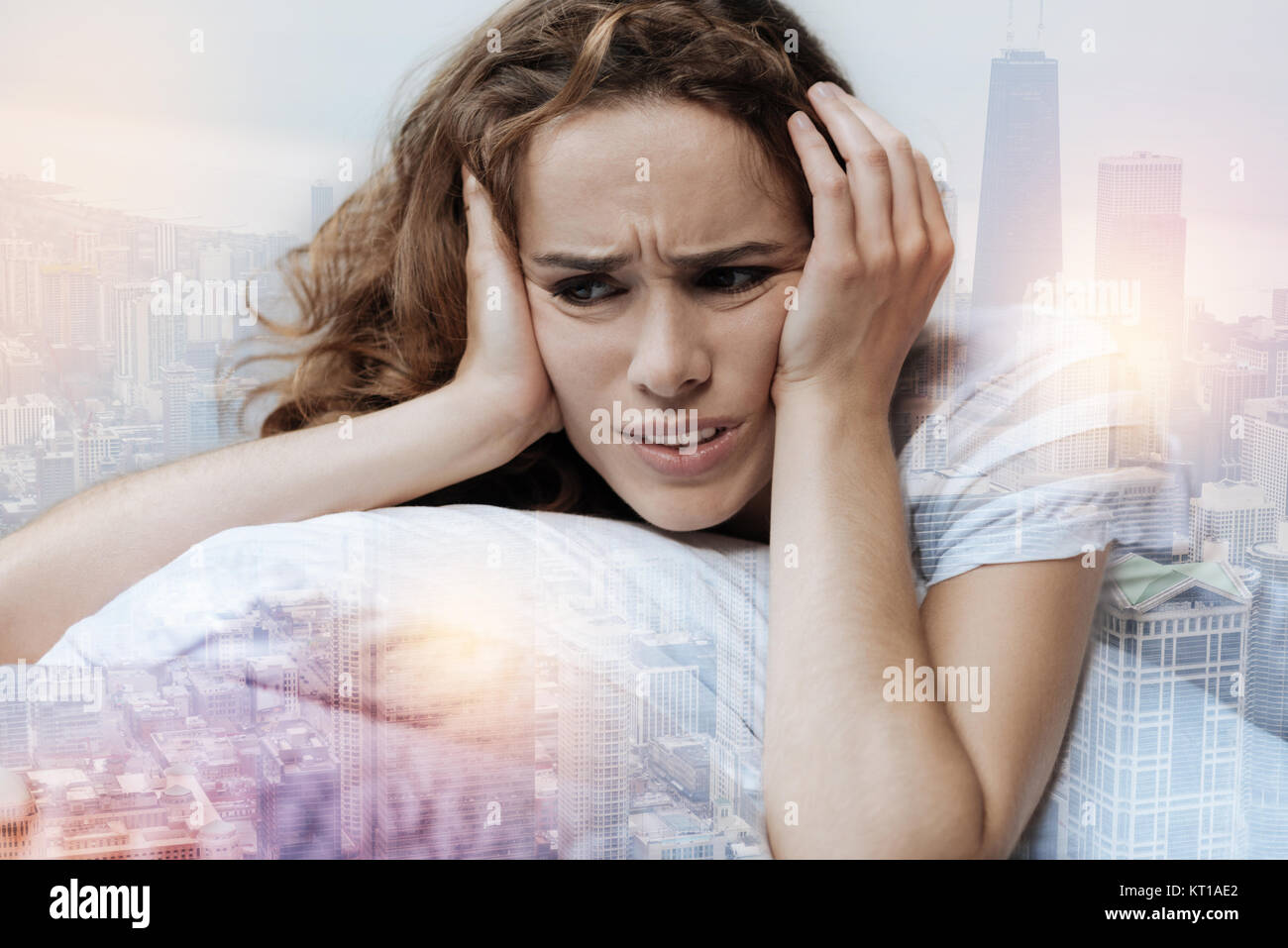 Close up of depressed woman that being deep in thoughts Stock Photo