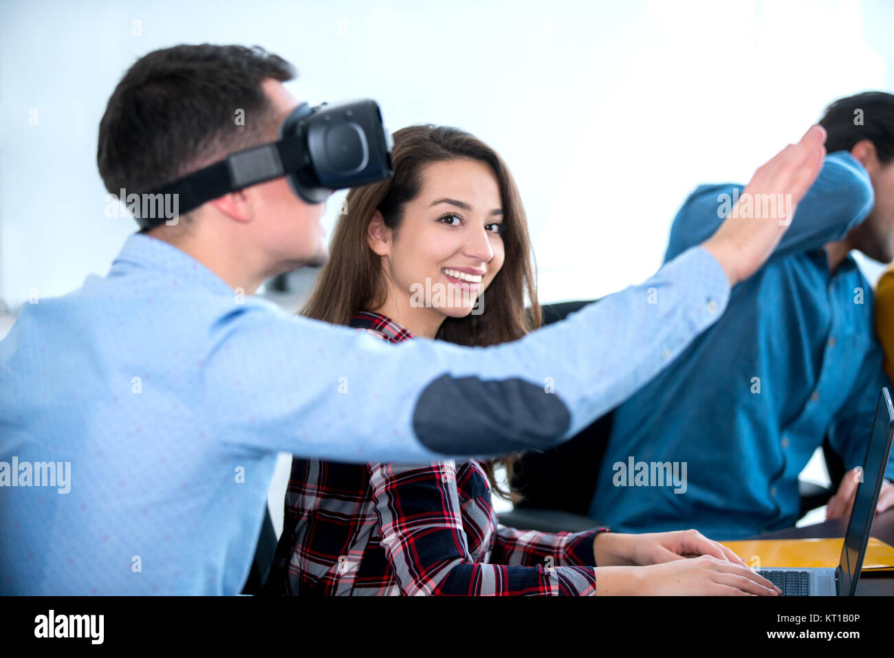 Young people having fun at startup metting discusting ideas Stock Photo