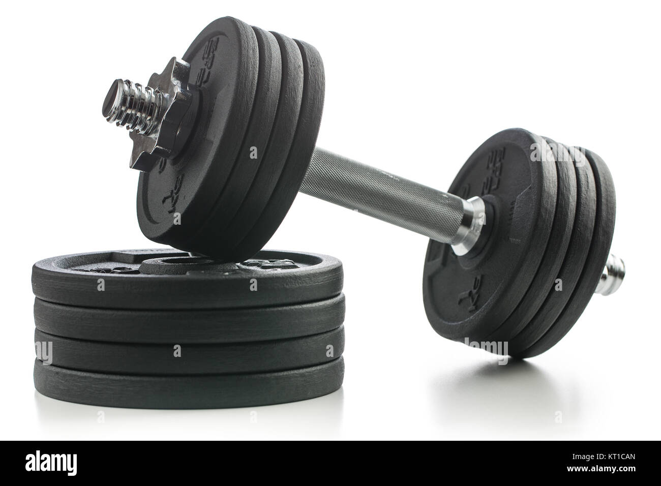 The metal dumbbell and weights Stock Photo Alamy