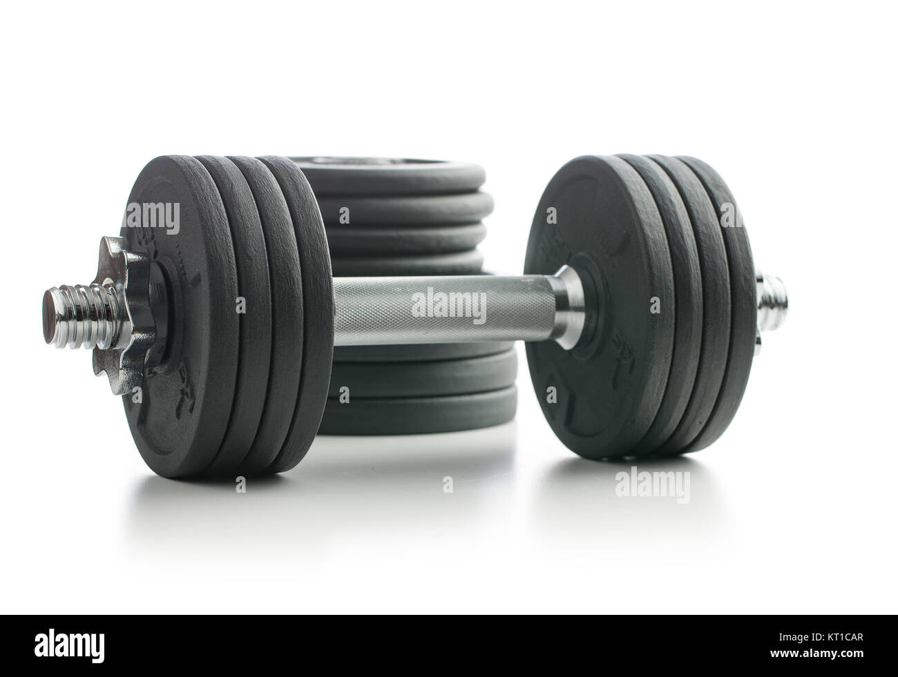 The metal dumbbell and weights Stock Photo Alamy