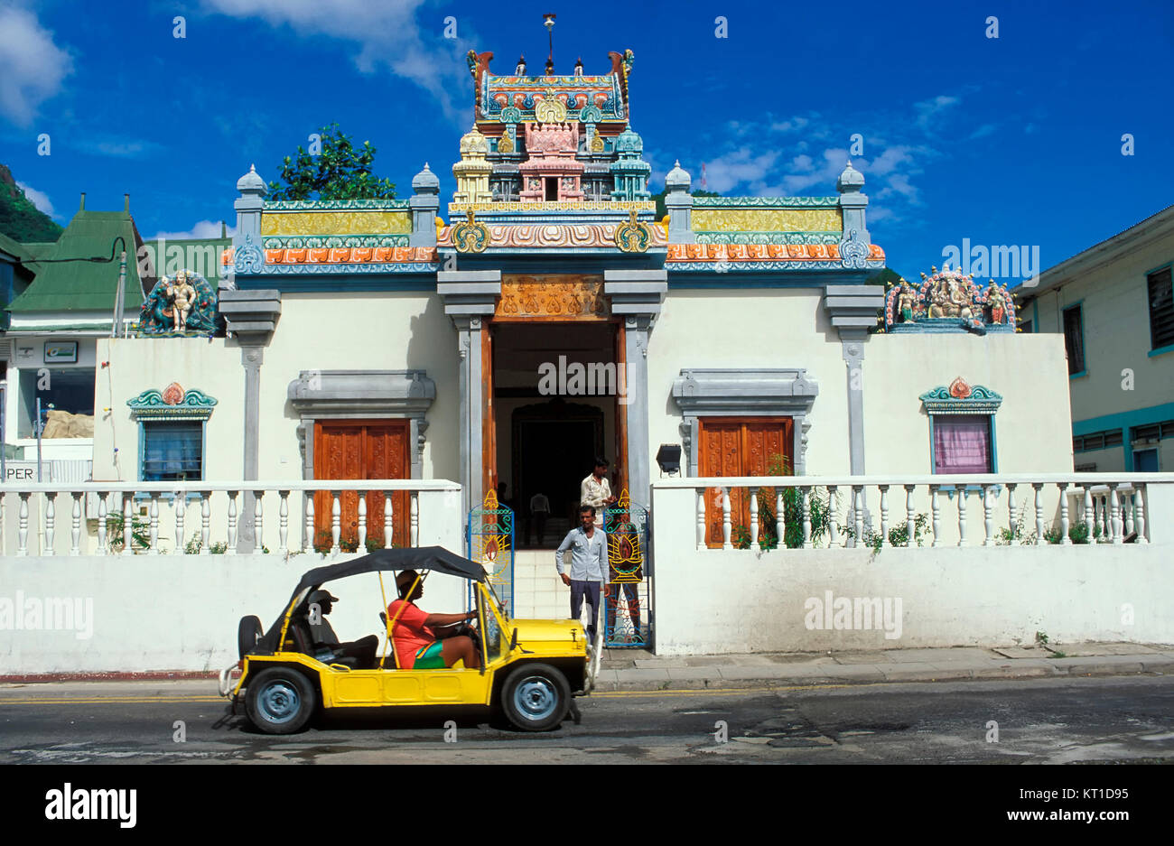 Mini-Moog in front of a Tempel,  Victoria, Mahe island, Seychelles Stock Photo