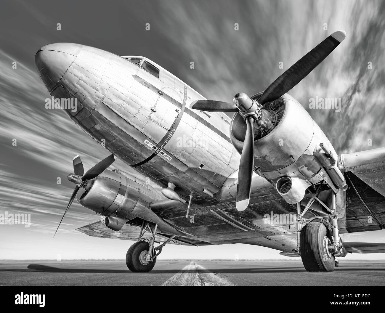 historic airplane on a runway Stock Photo