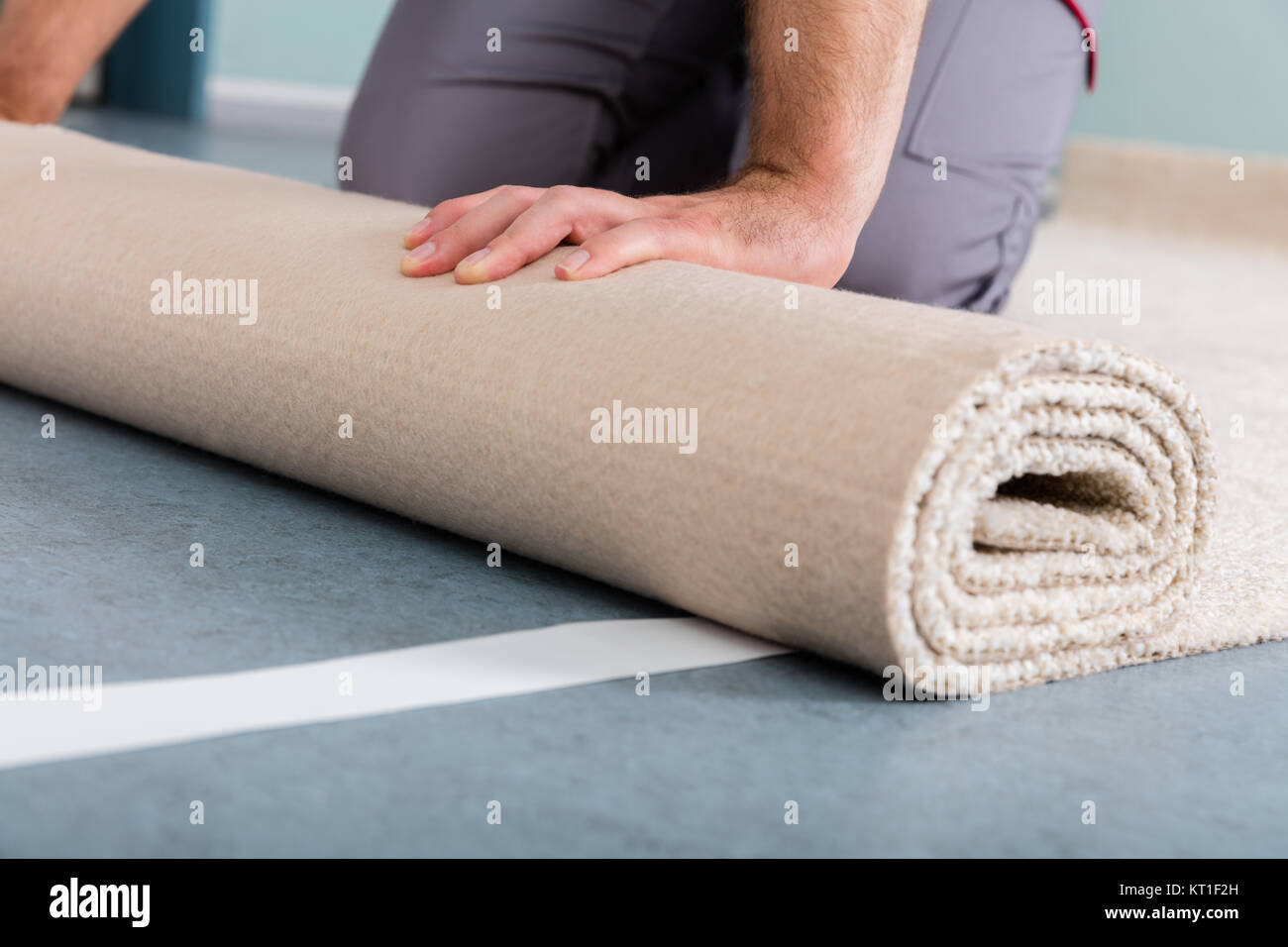 Worker's Hands Rolling Carpet Stock Photo Alamy