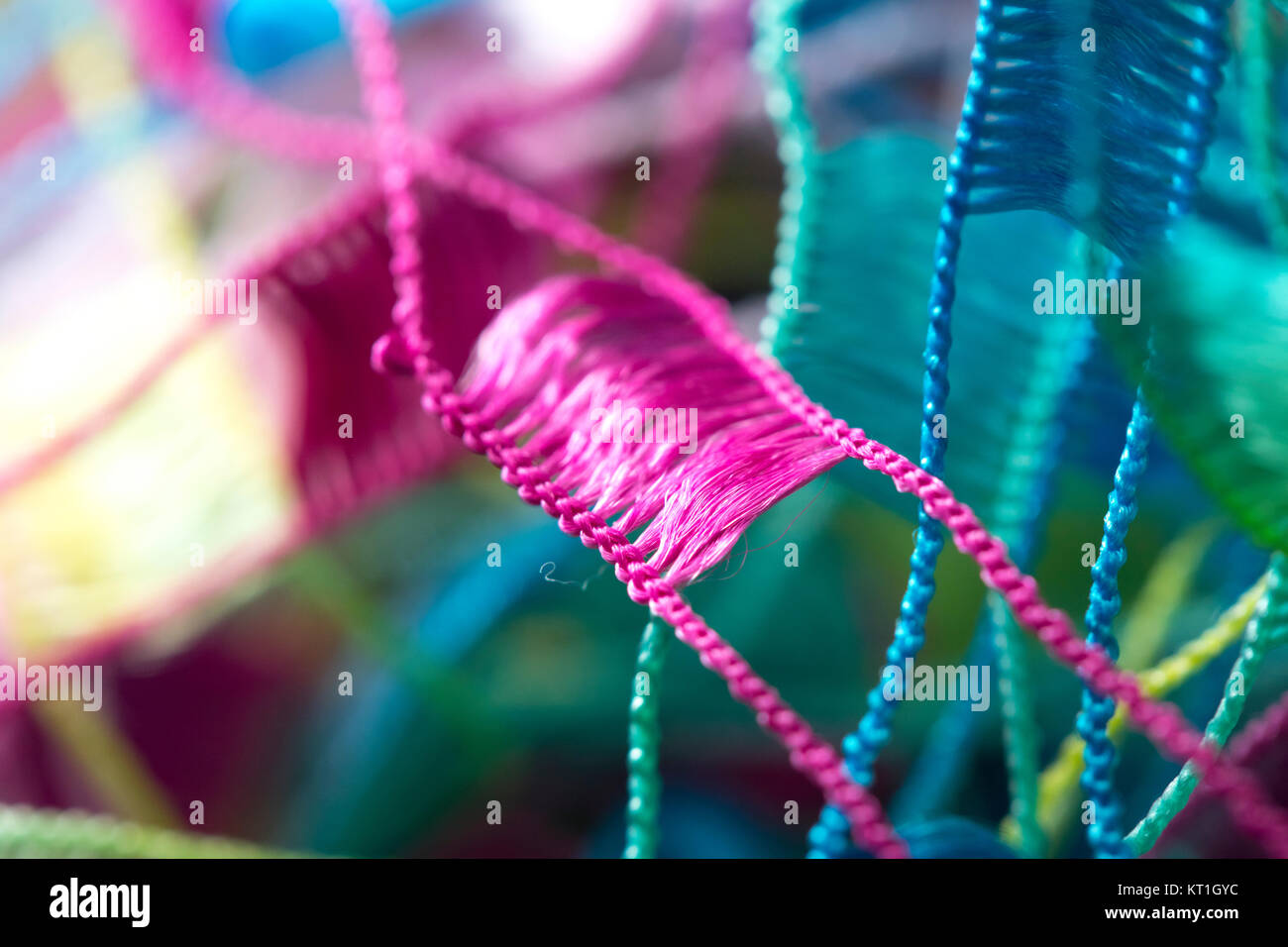 Red yellow blue string tangled hi-res stock photography and images - Alamy