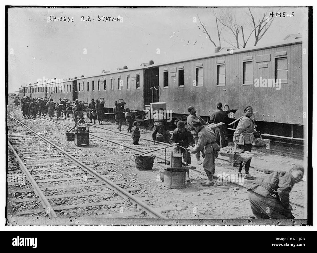 This Photograph Depicts A Chinese Railway Station Showcasing Early