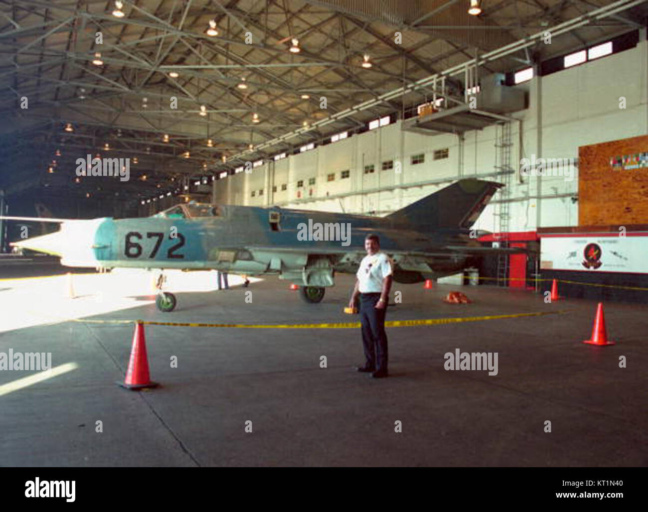 In this photograph, Dale M. McDonald stands alongside a Cuban MIG-21 ...