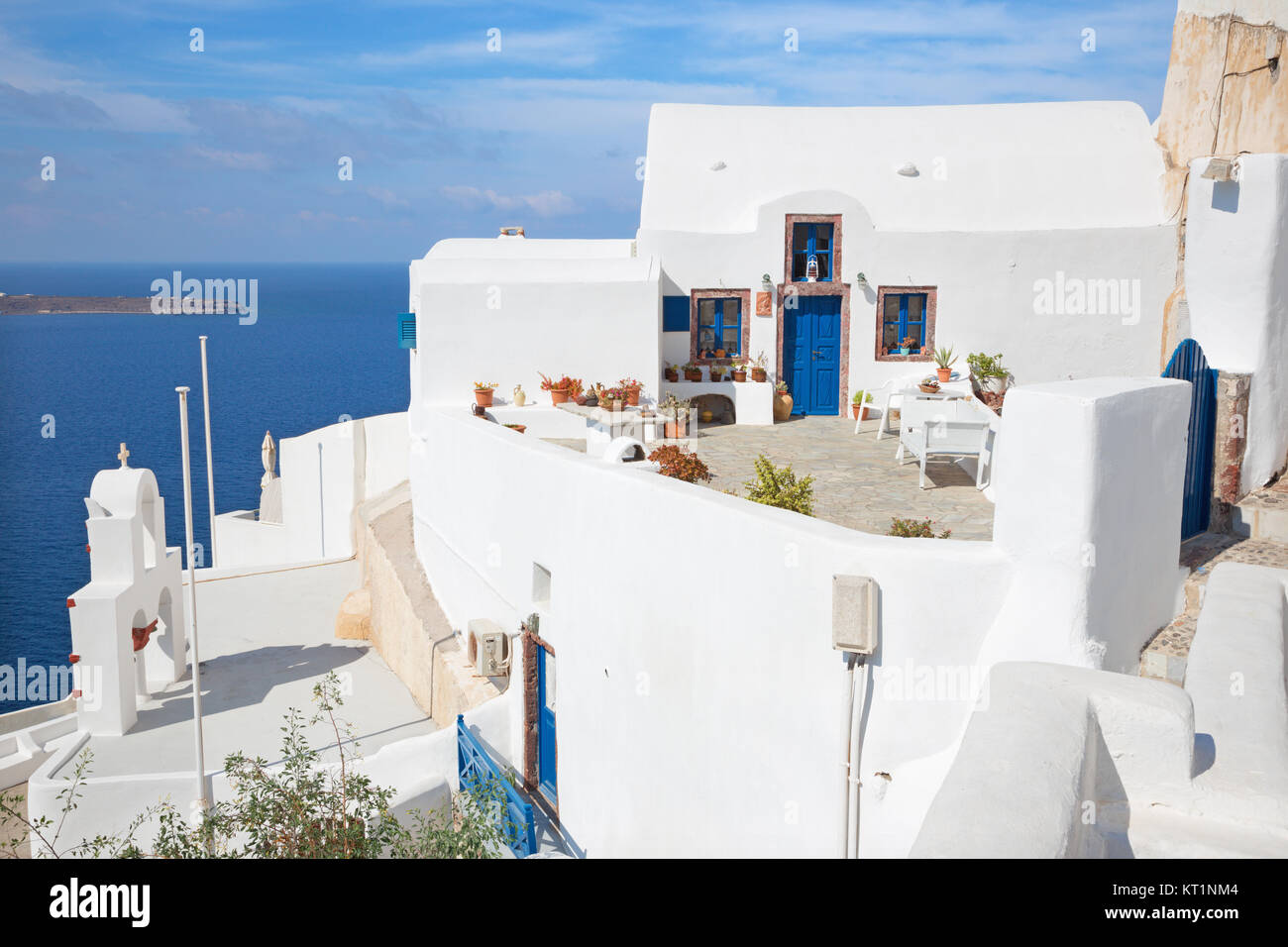 Santorini - The typically little house and yard with he flowers in Oia. Stock Photo