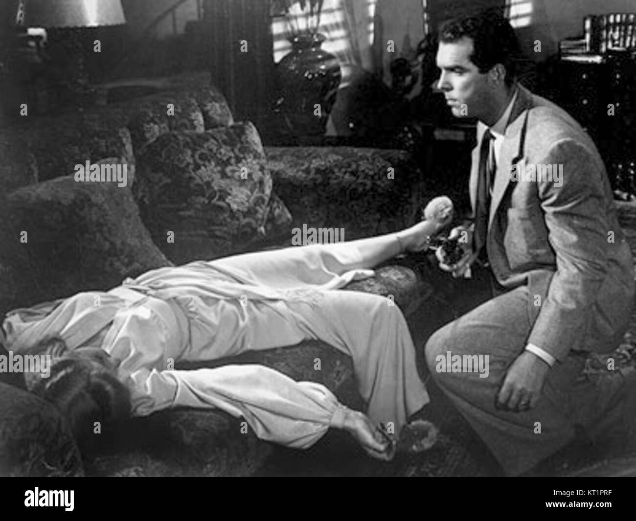 Double indemnity Black and White Stock Photos & Images - Alamy