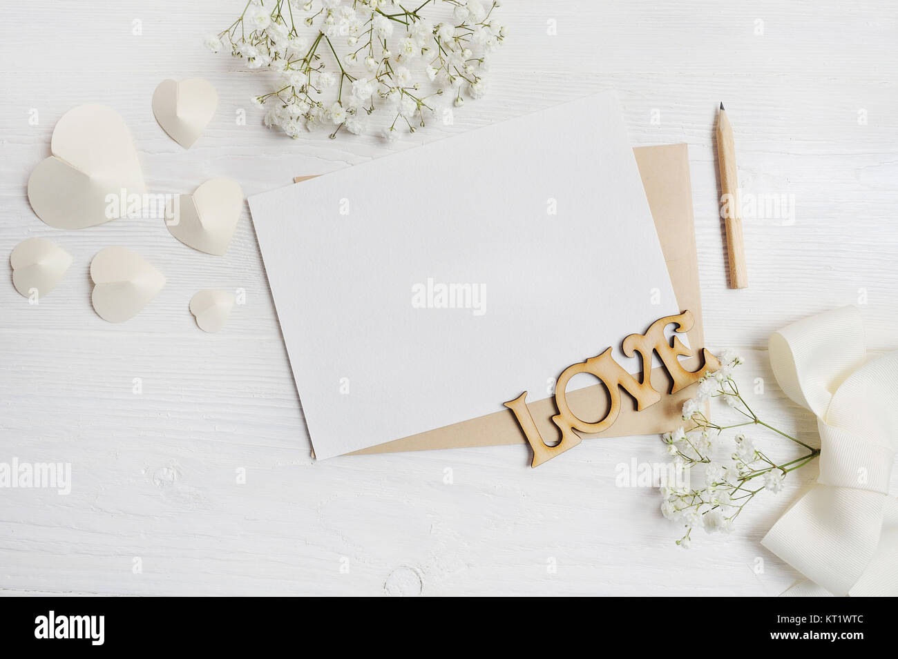 mockup Letter with pen greeting card for St. Valentine's Day in rustic style with place for your text, Flat lay, top view photo mock up. Stock Photo
