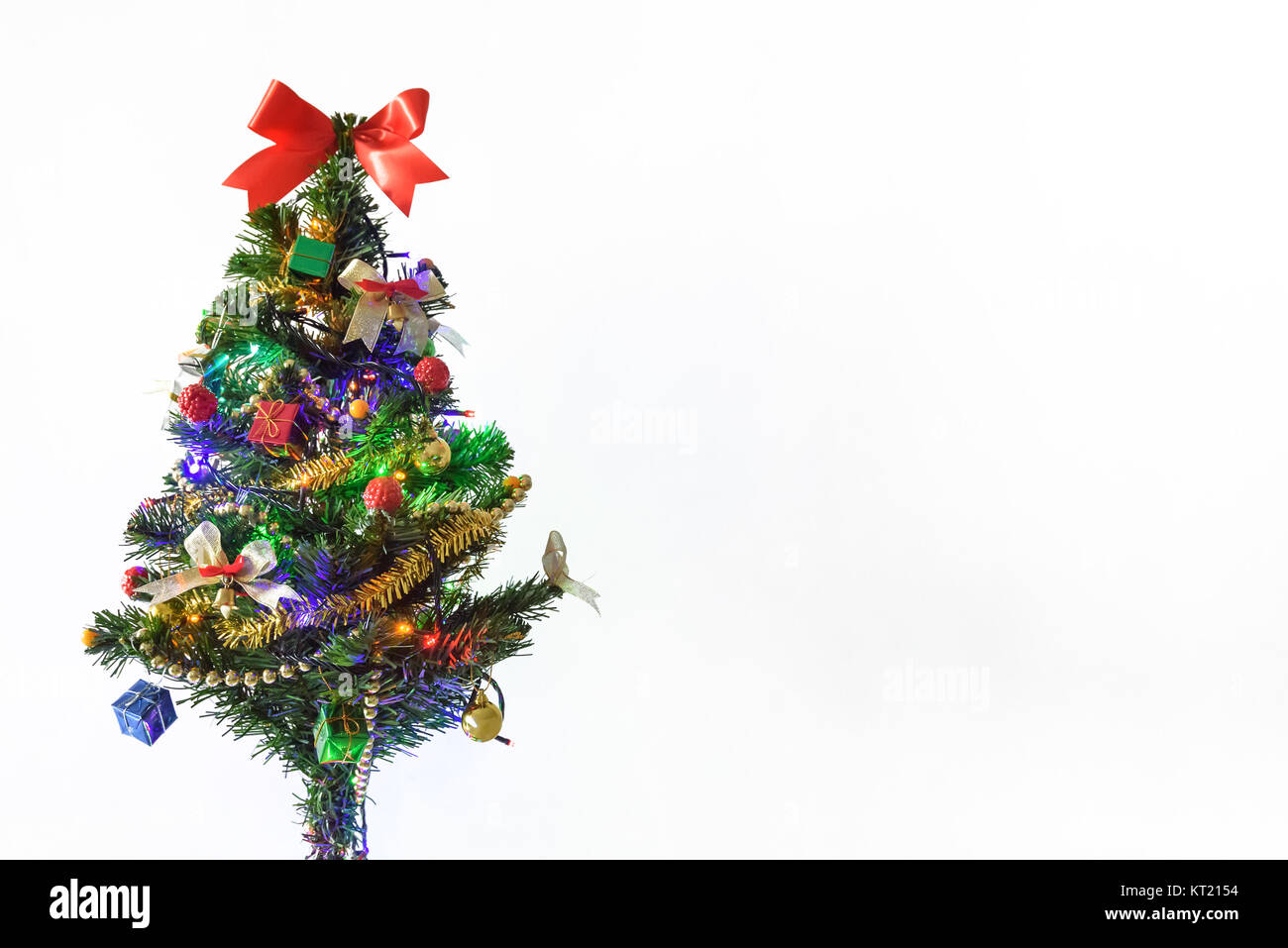 decorated christmas tree with light and gift on white background, 2018 happy new year concept, copyspace Stock Photo