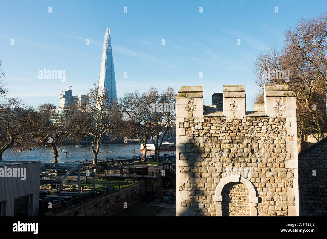 The Shard Building with Part of The Tower of London and River Thames from North Bank London England United Kingdom UK Stock Photo