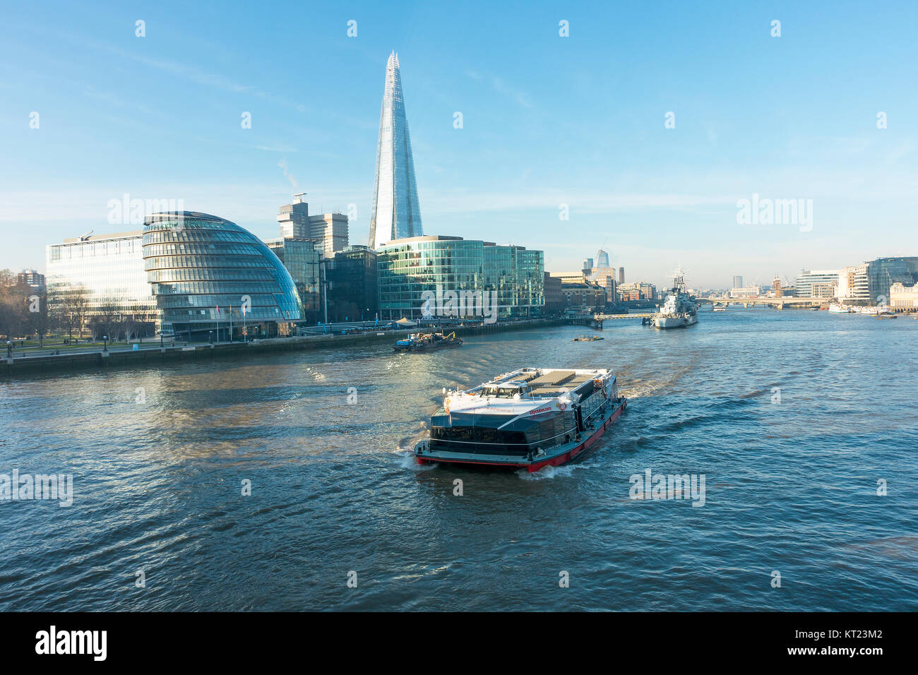 City Hall and The Shard Buildings with City Cruises Passenger Ferry on River Thames Southbank from Tower Bridge London United Kingdom UK Stock Photo