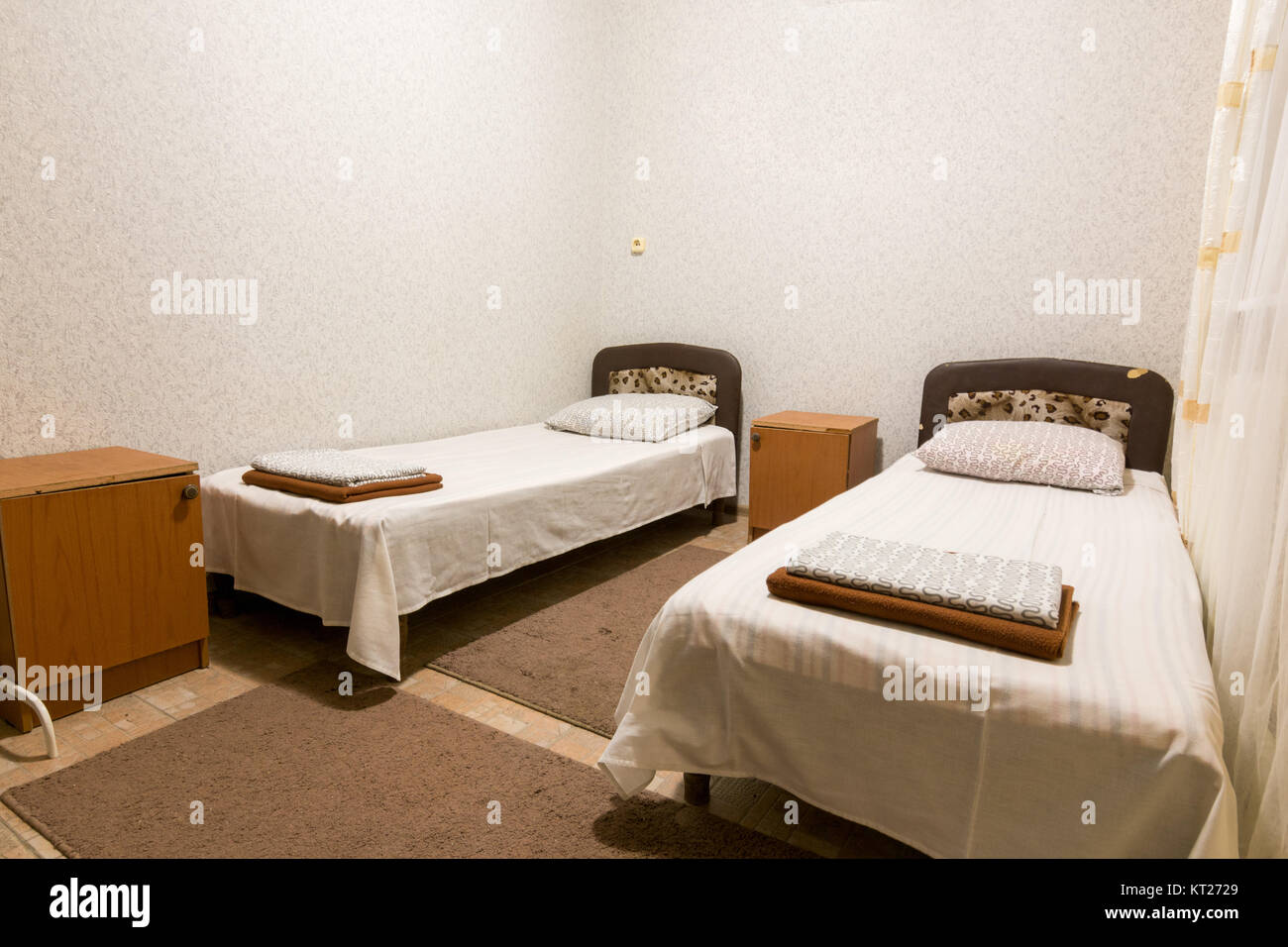The interior of a small room with two beds Stock Photo   Alamy