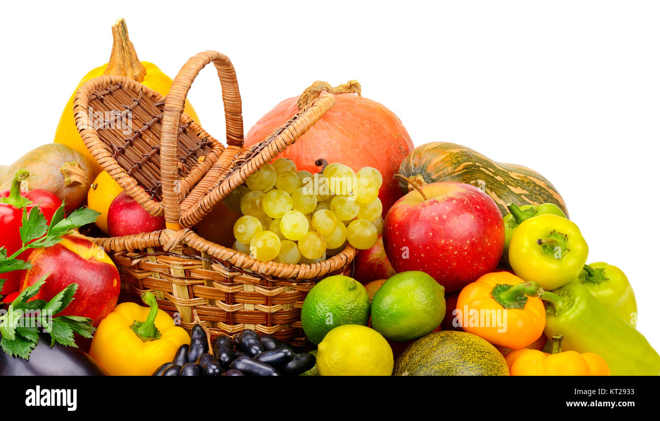 Basket with fresh fruits and vegetables isolated on a white background