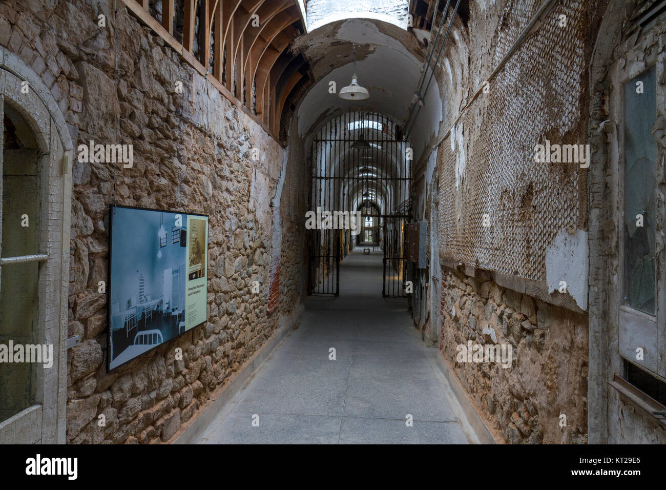 View along prison wing corridor in the Eastern State Penitentiary Historic Site, Philadelphia, United States. Stock Photo