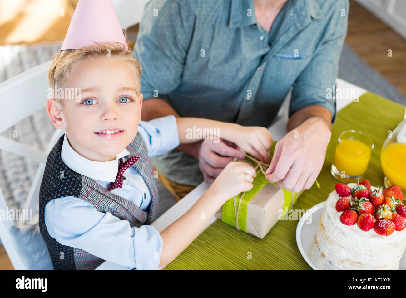 Father and son packing gift Stock Photo Alamy