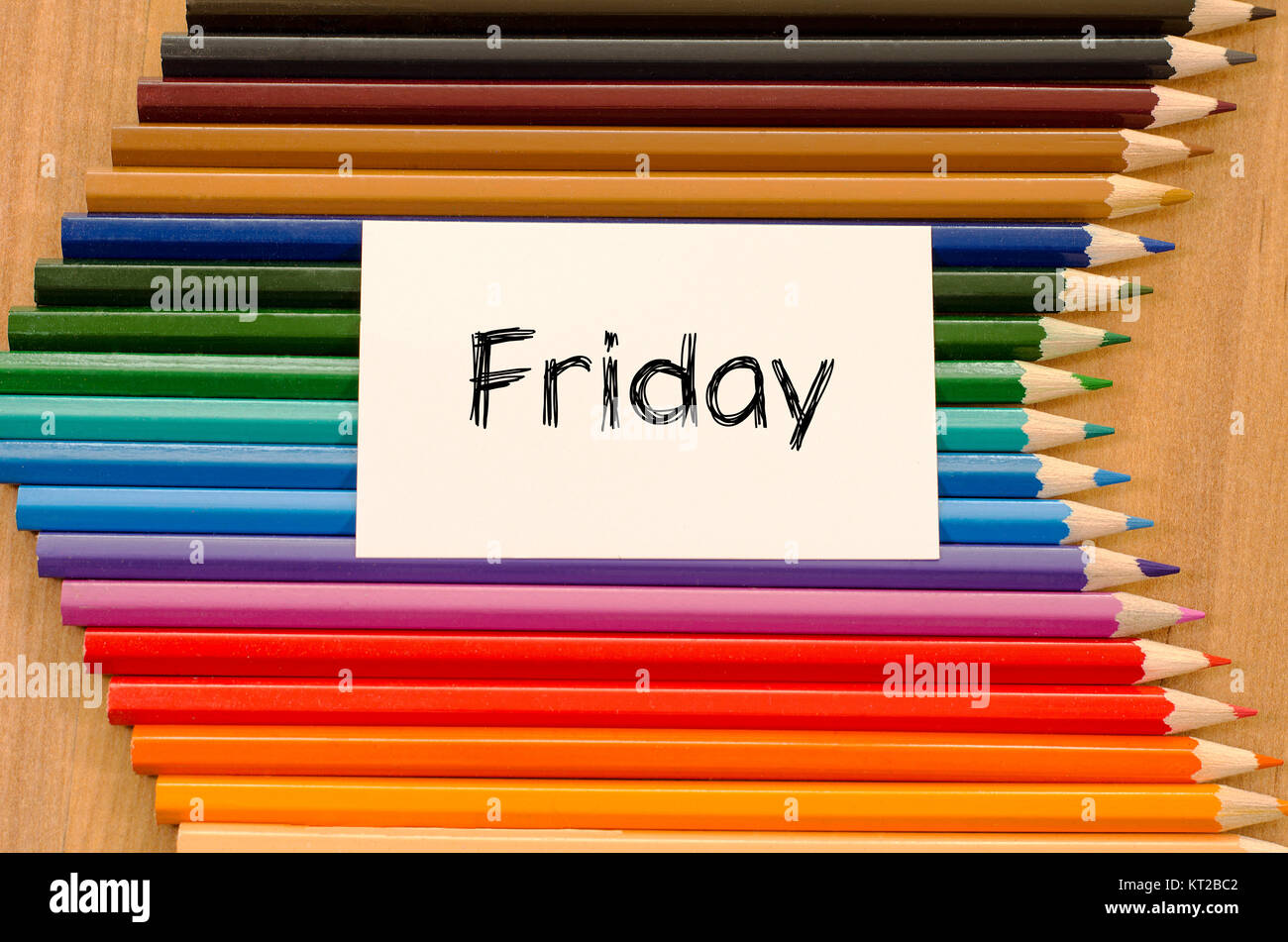 Friday text concept over white note Stock Photo