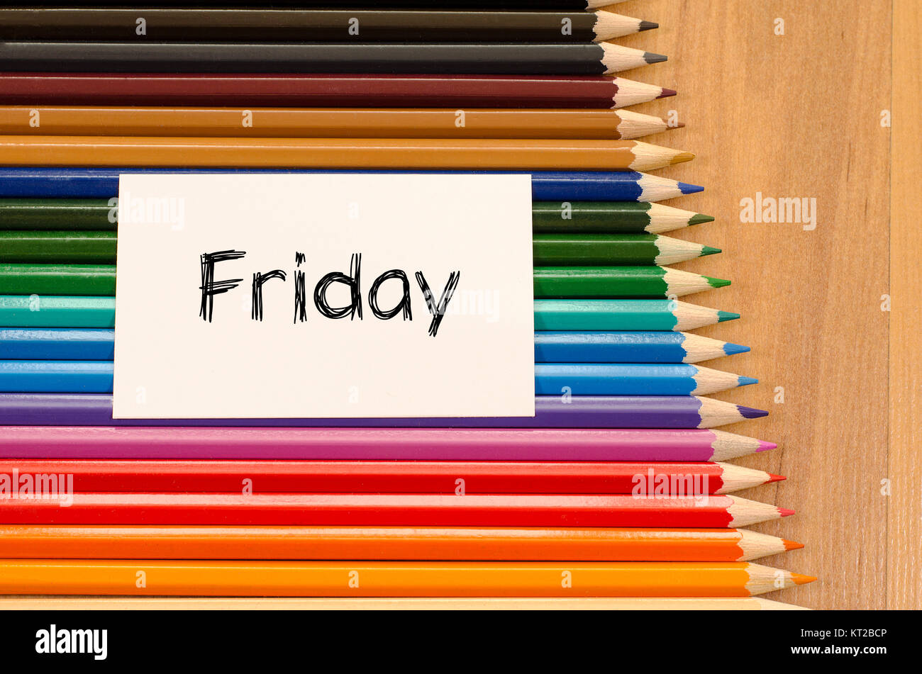 Friday text concept over white note Stock Photo