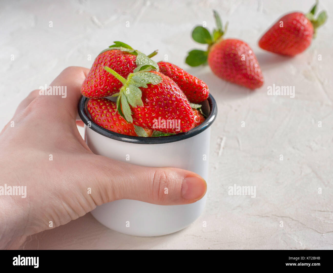 strawberries in wooden bowl Stock Photo - Alamy