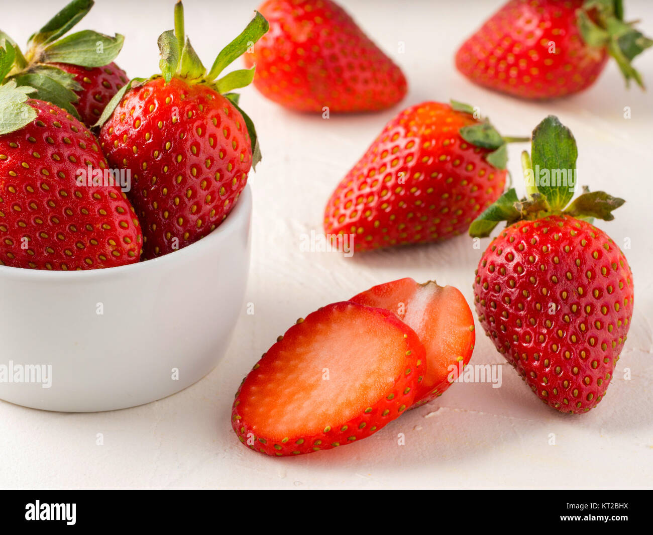 strawberries in wooden bowl Stock Photo - Alamy
