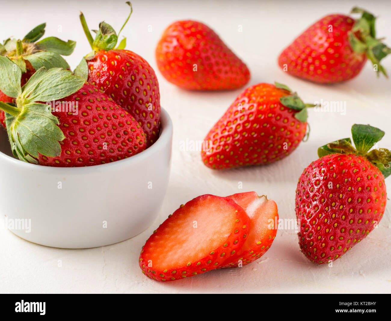 strawberries in wooden bowl Stock Photo - Alamy