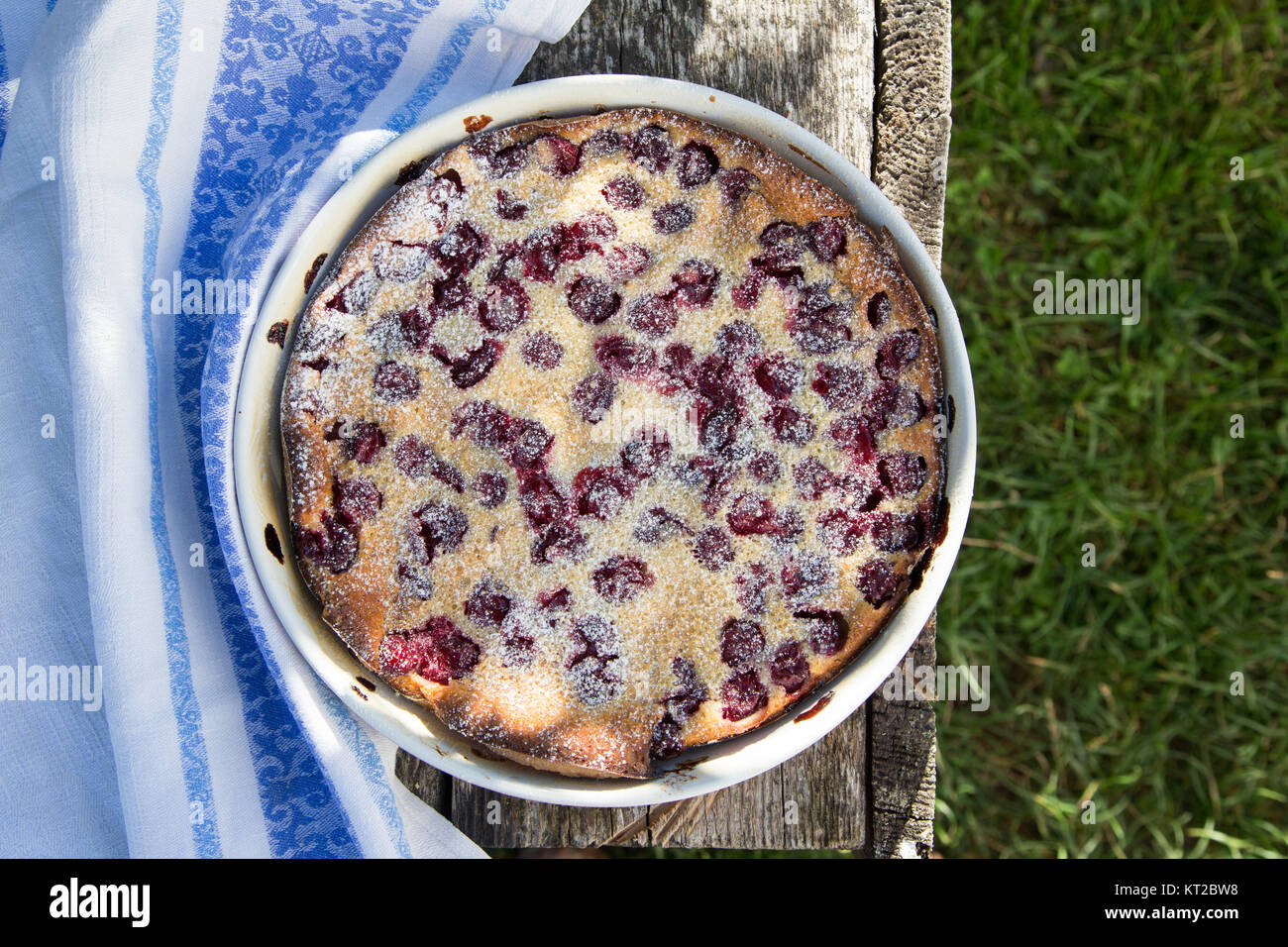 Cherry clafoutis. Homemade cherry pie on rustic background Stock Photo ...