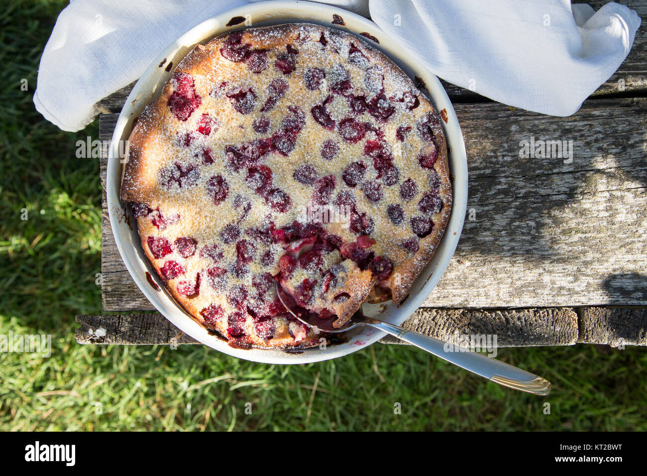 Cherry clafoutis. Homemade cherry pie on rustic background Stock Photo ...
