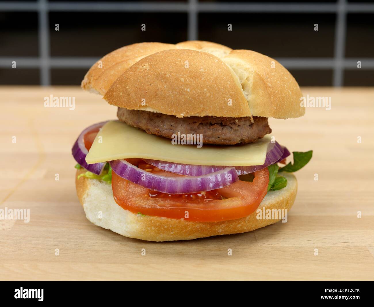 A freshly made American style hamburger with sauce Stock Photo Alamy