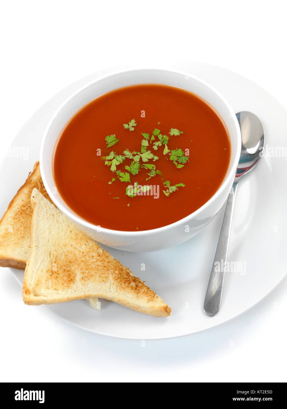 Tomato soup isolated against a white background Stock Photo - Alamy