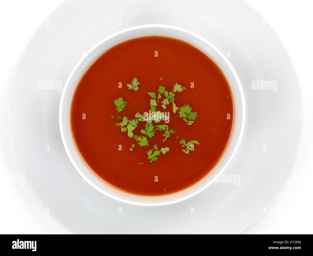 Tomato soup isolated against a white background Stock Photo - Alamy