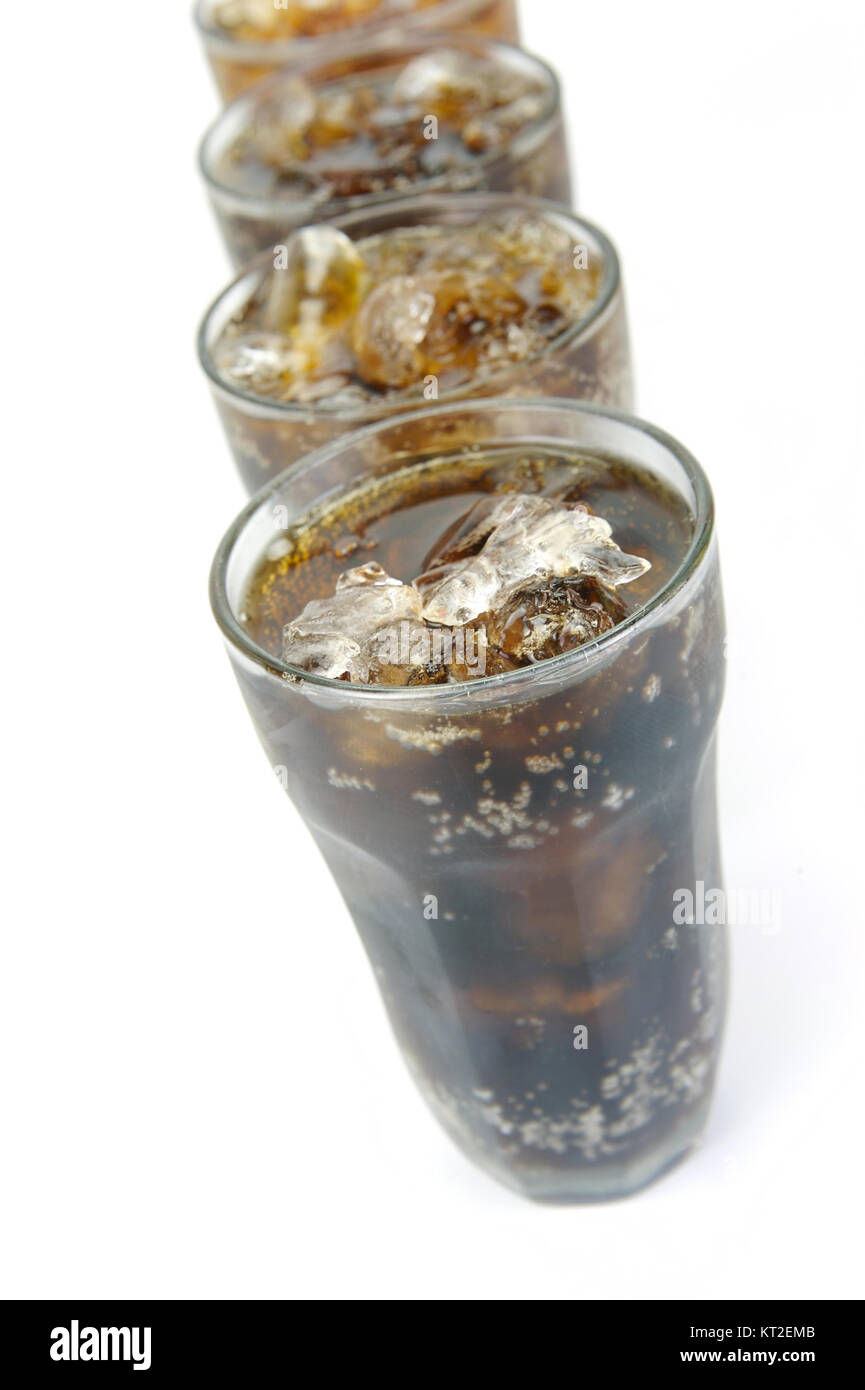 Glasses of cola isolated against a white background Stock Photo - Alamy