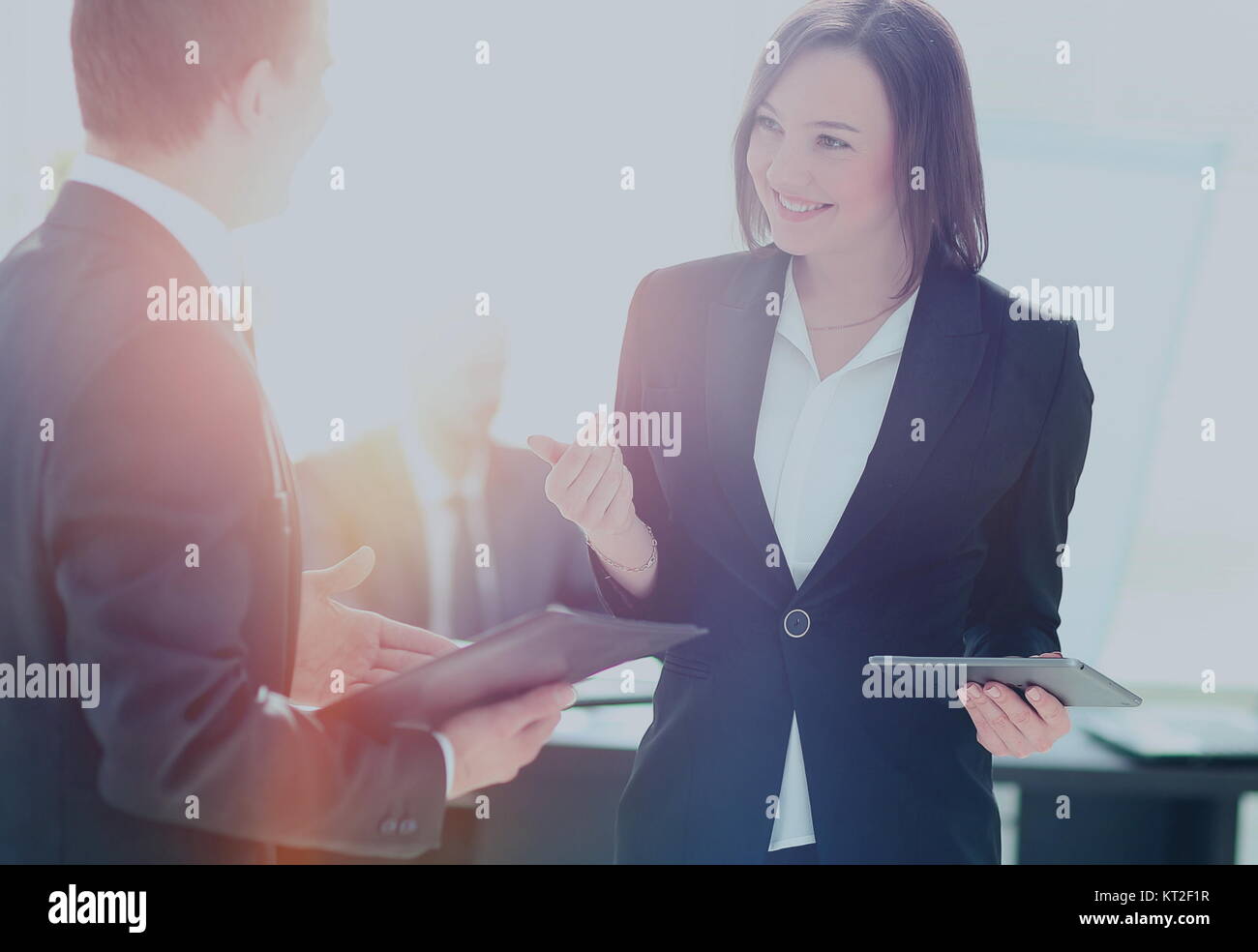 Businessman And Businesswoman Meeting In Modern Office Stock Photo - Alamy