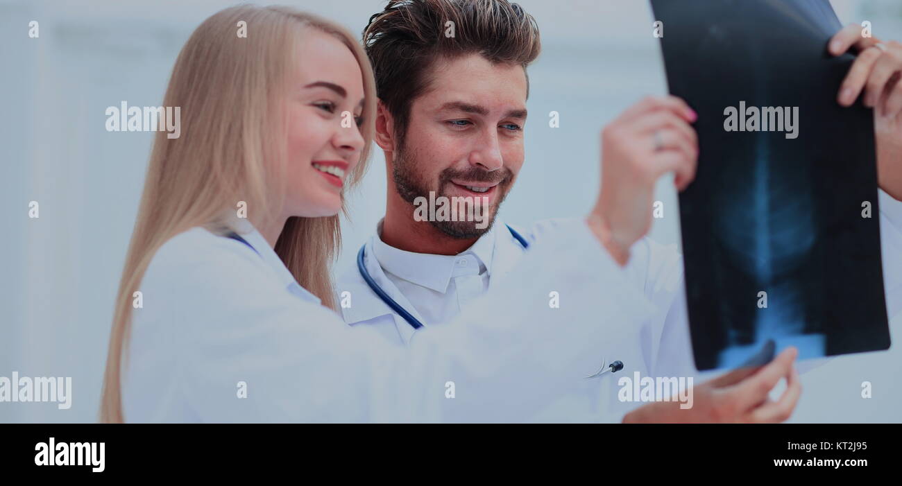 medical and radiology concept - two doctors looking at x-ray Stock ...