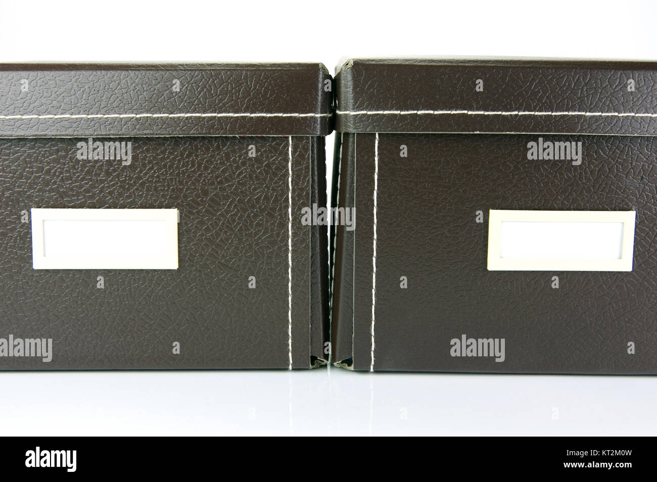 Brown stationery boxes isolated against a white background Stock Photo