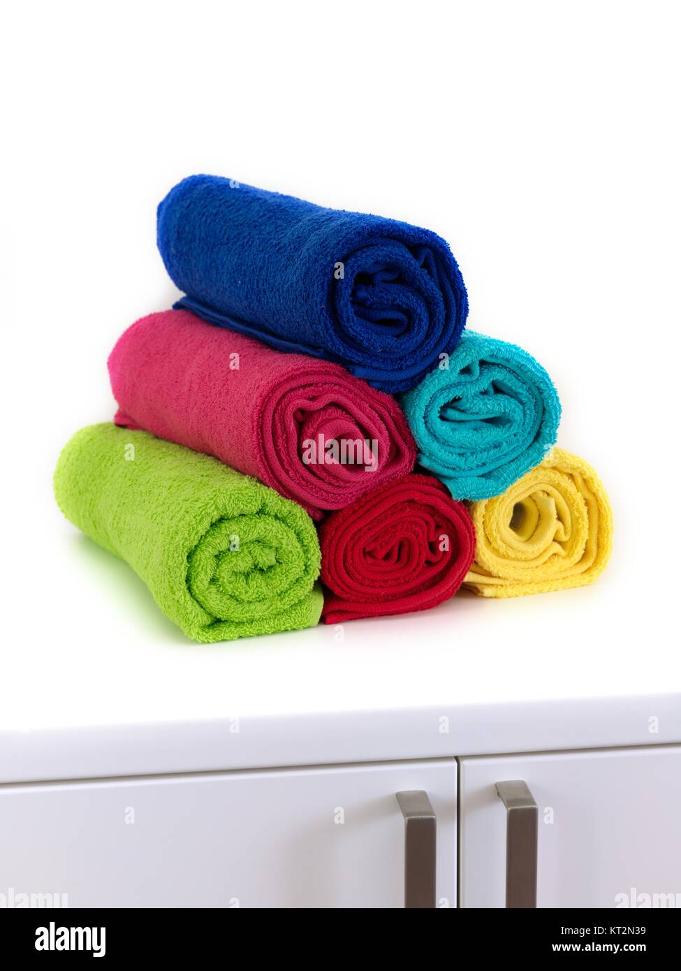 https://c8.alamy.com/comp/KT2N39/colored-bathroom-towels-isolated-against-a-white-background-KT2N39.jpg