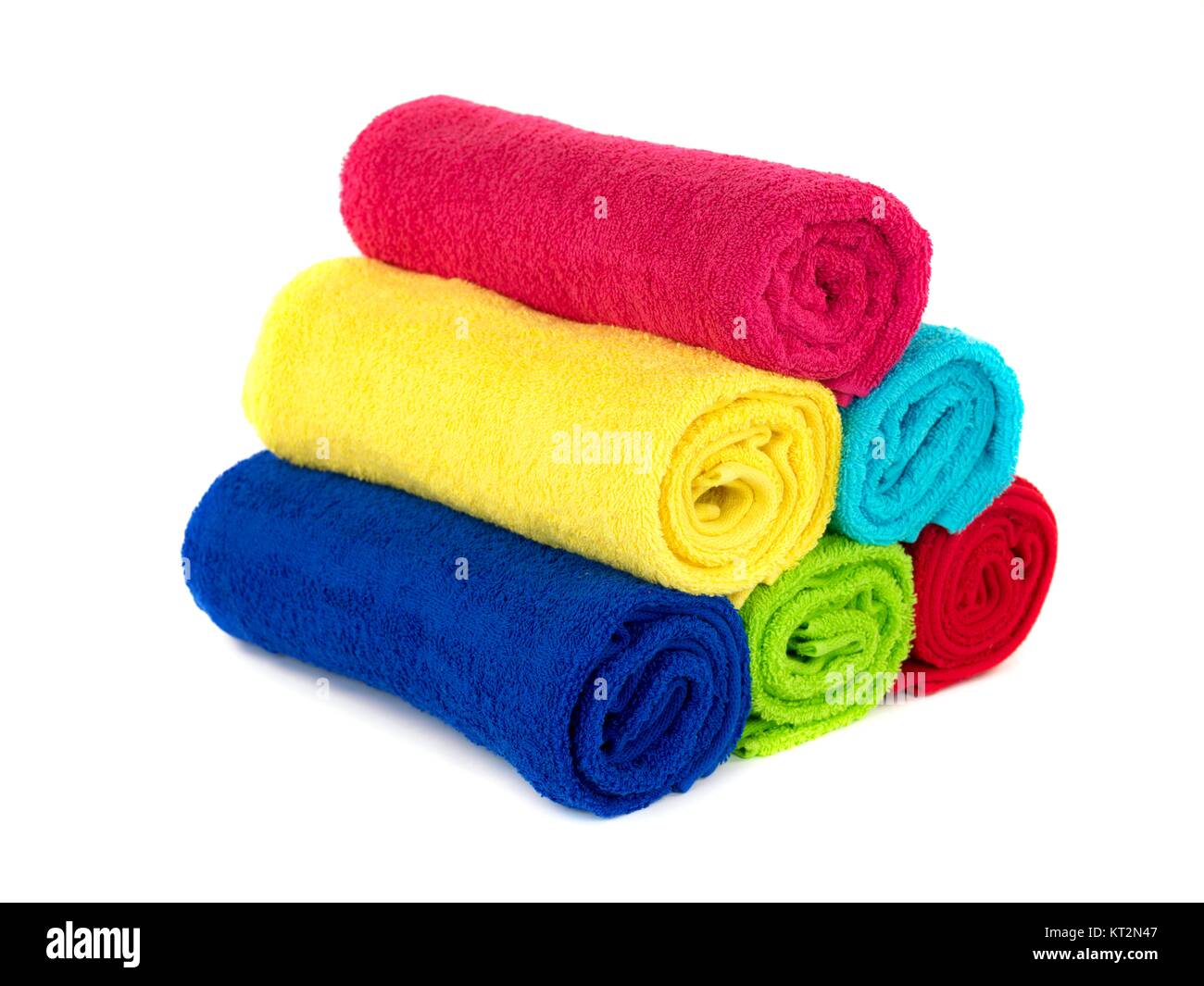 Colored bathroom towels isolated against a white background Stock Photo