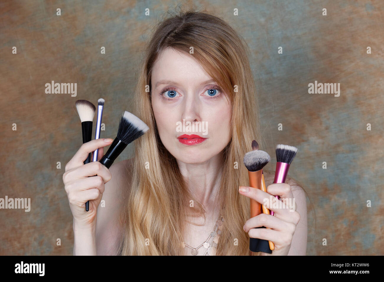Beautiful woman hands brushes hi-res stock photography and images - Alamy