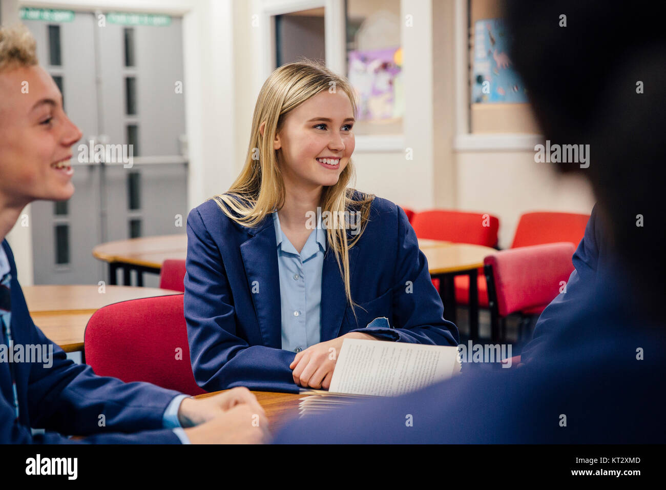 Working Together In The Classroom Stock Photo - Alamy