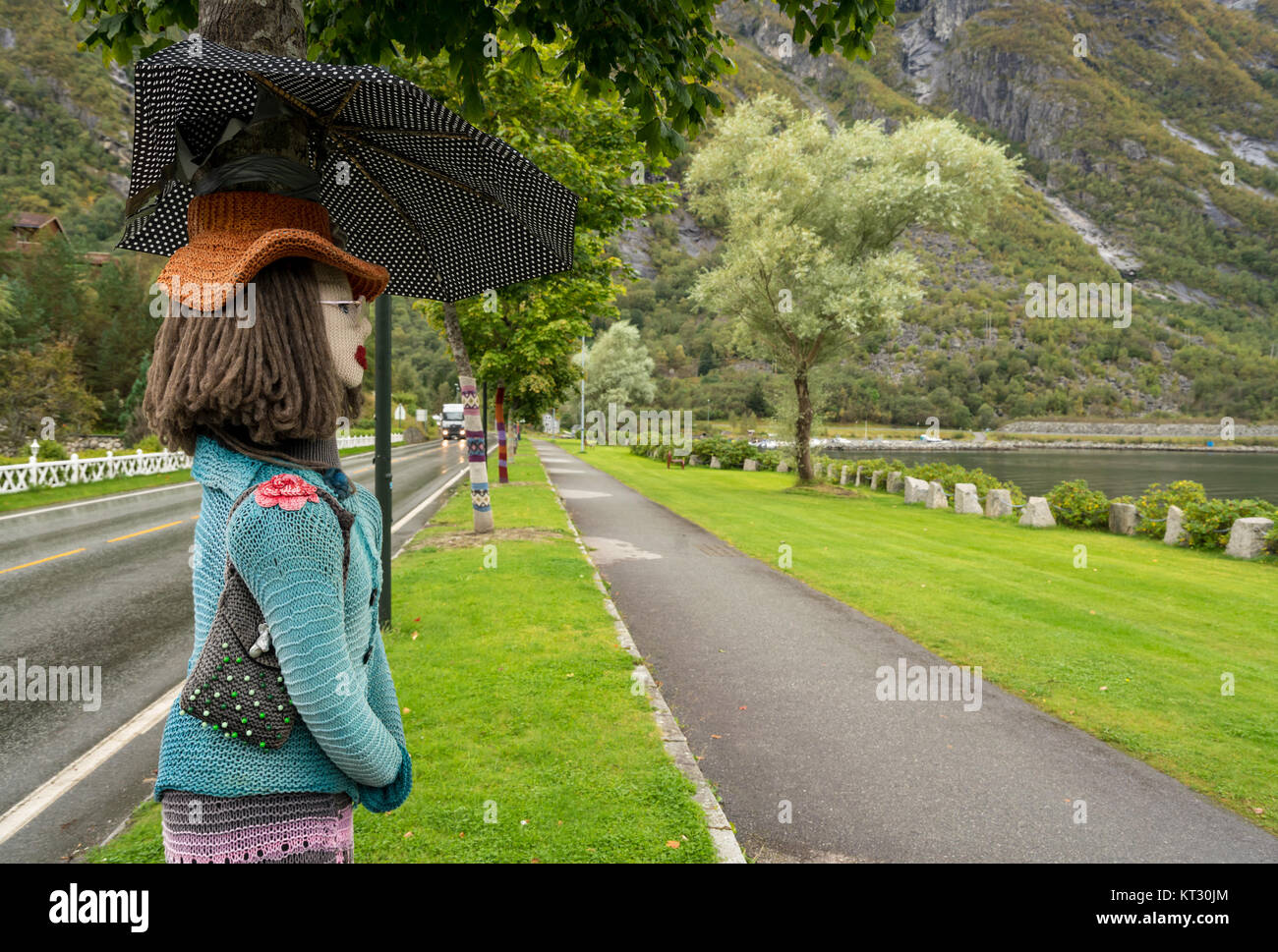 Woolen knitwear covers tree trunks at Eidfjord in Norway Stock Photo