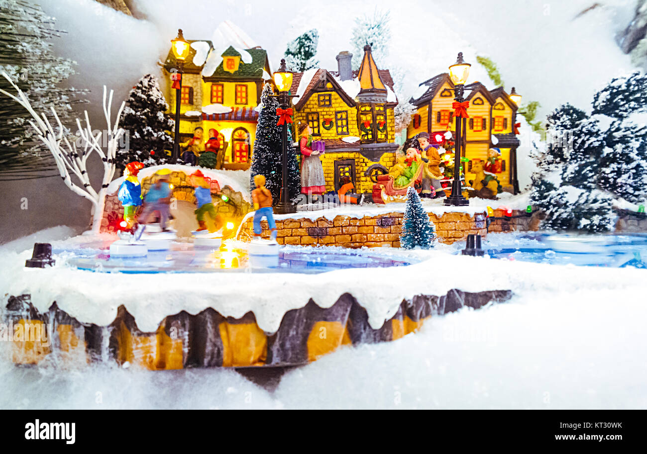 Miniature Christmas village scene. Christmas decorations toys Stock