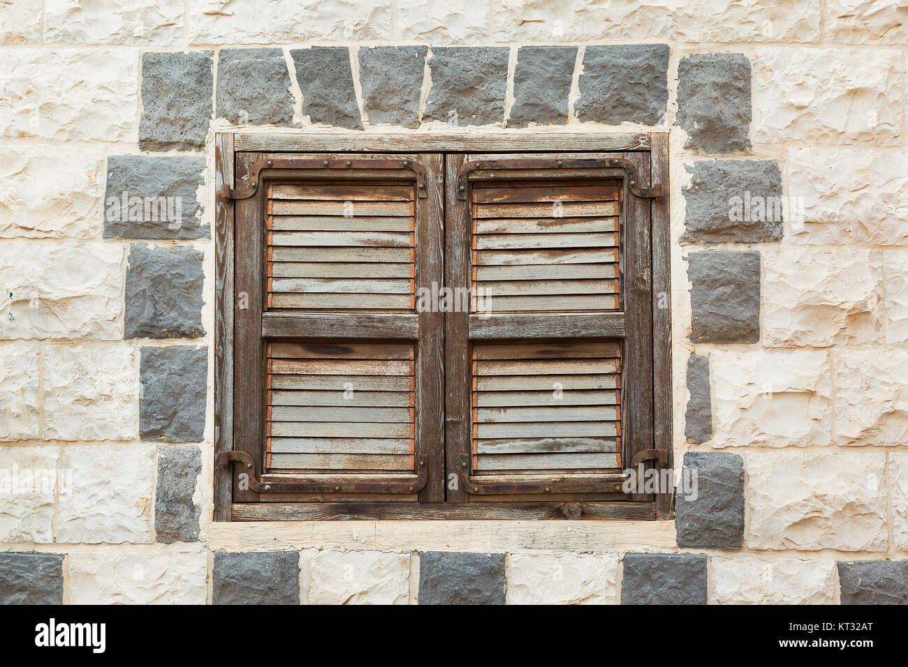 Old wooden window on a stone wall Stock Photo - Alamy