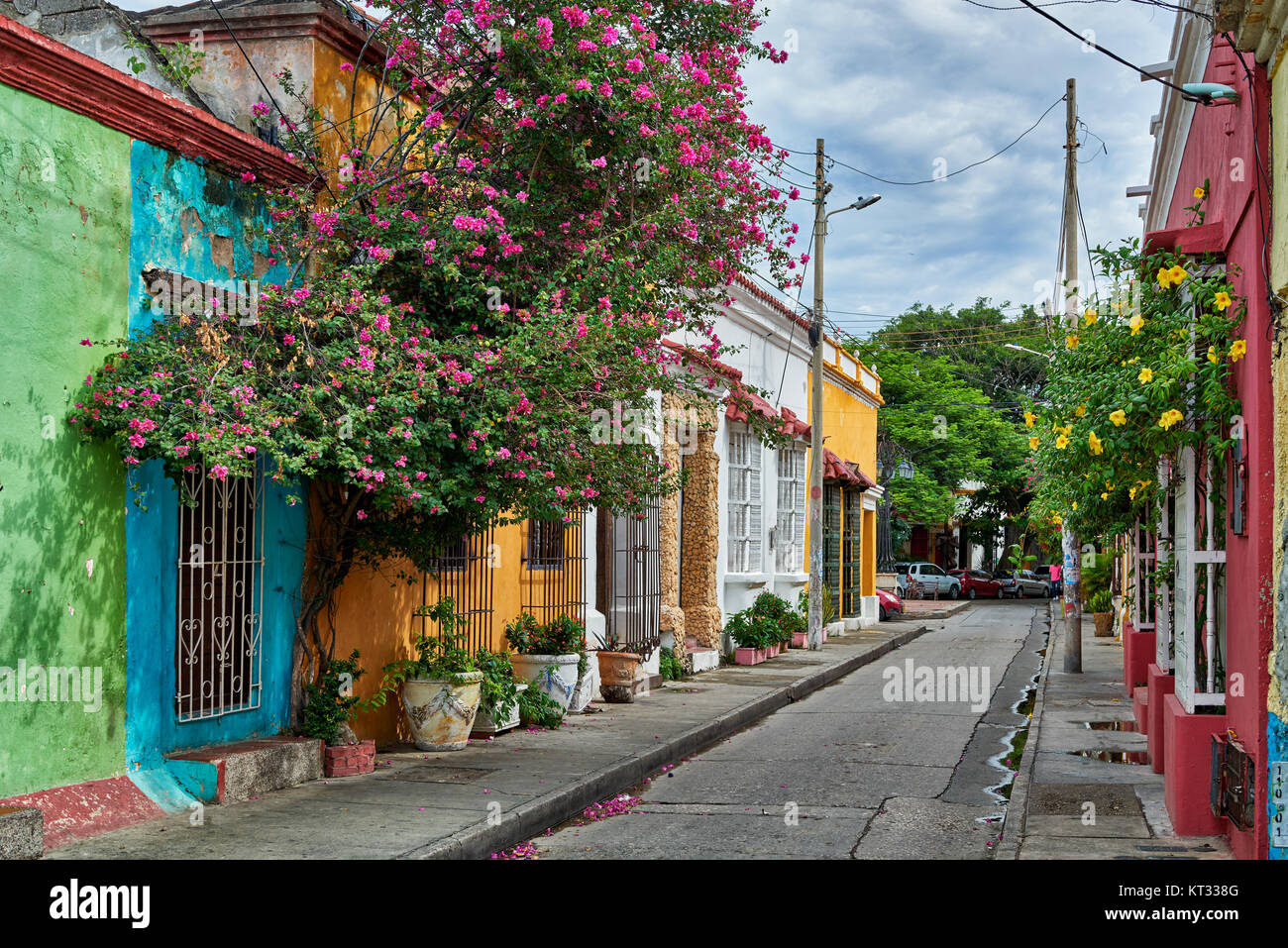 typical colorful facades with flowers of houses in district Getsemani of Cartagena de Indias, Colombia, South America Stock Photo