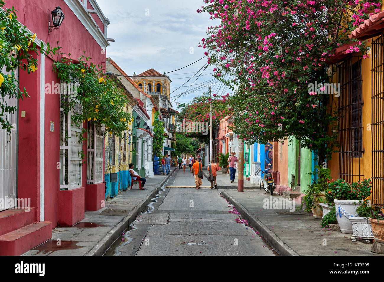 typical colorful facades with flowers of houses in district Getsemani of Cartagena de Indias, Colombia, South America Stock Photo