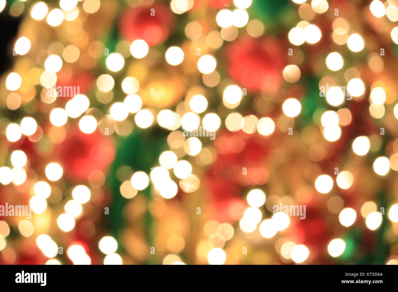 Christmas tree on abstract light golden bokeh background. Stock Photo