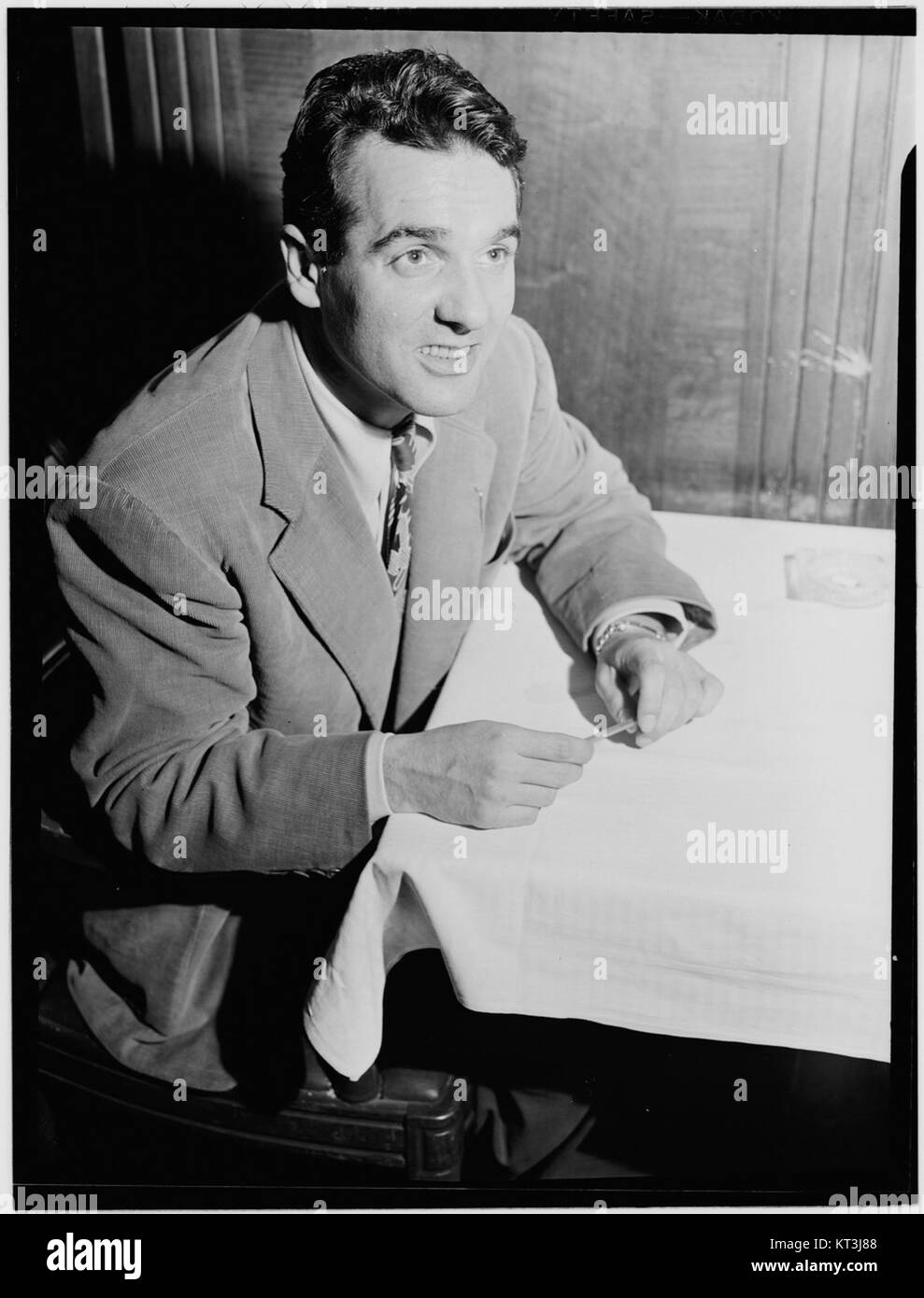 This photograph of Gene Krupa at the 400 Restaurant in New York City, taken in June 1946, captures the famous jazz drummer in a historic setting during the post-war era. Stock Photo