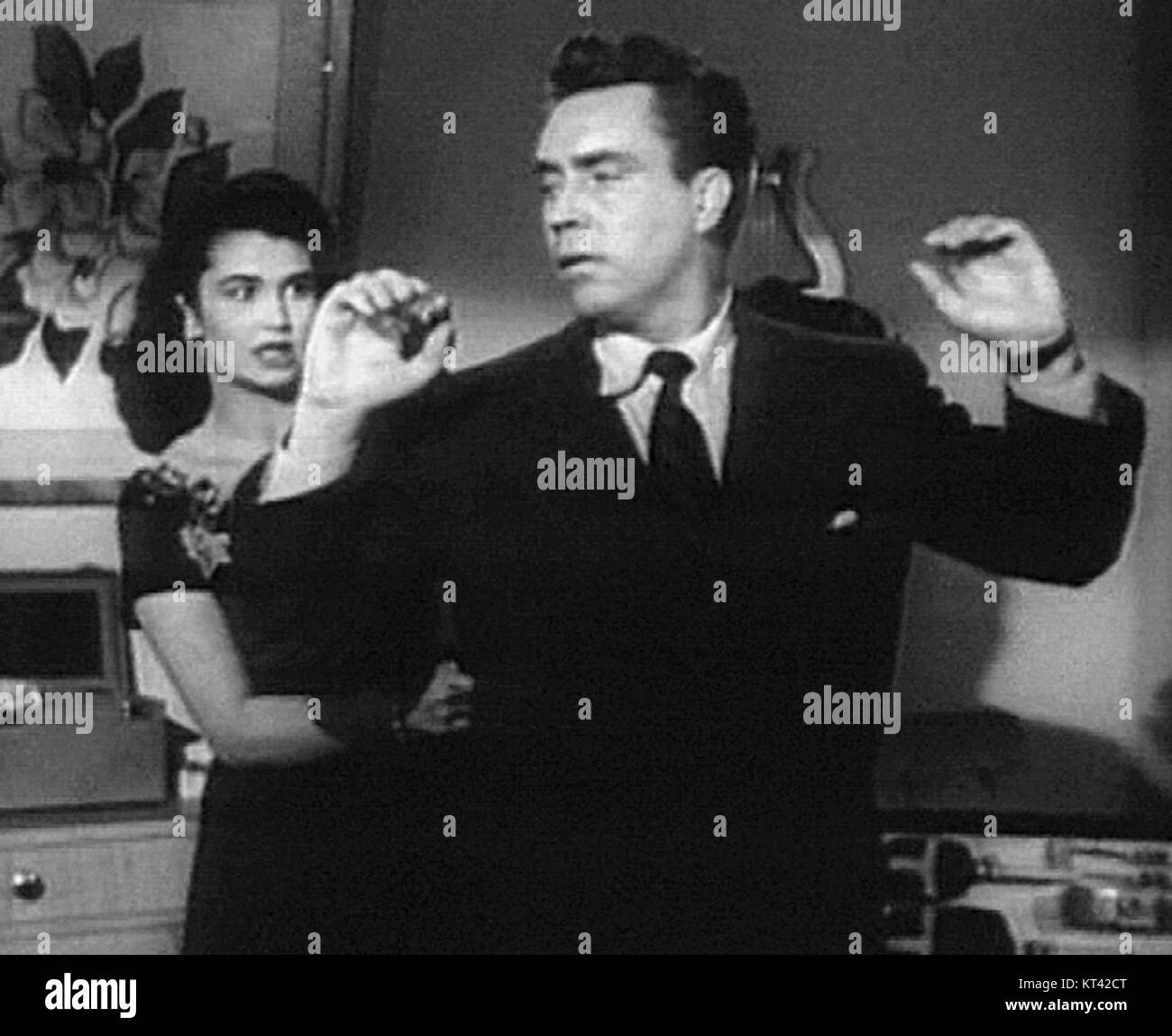Laurette Luez and Edmond O'Brien starred in the 1950 film noir 'DOA,' a thriller about a man who is poisoned and races against time to find his killer. Stock Photo