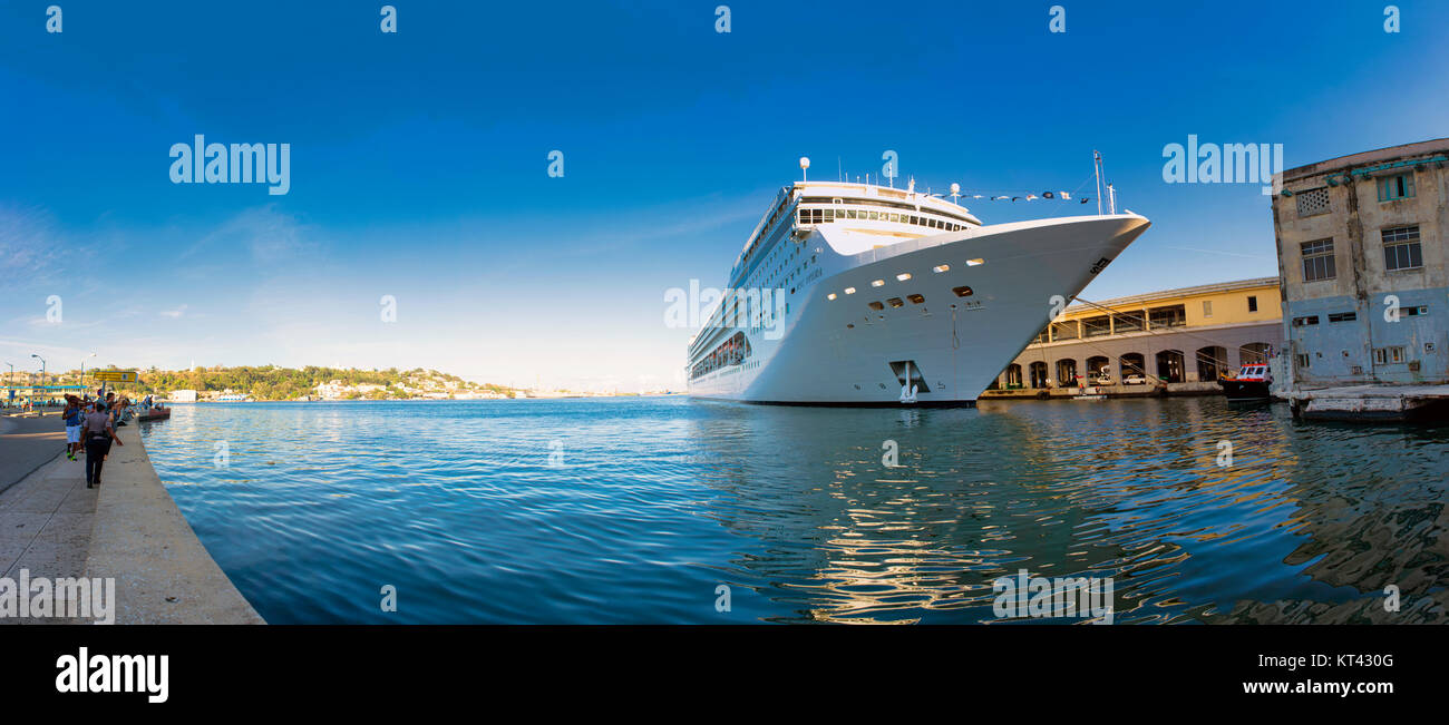 HAVANA, CUBA - FEB 17, 2017 : Panoramic view of the MSC Opera cruise ship docked at the port of Havana showing the tourist boom the island has experie Stock Photo