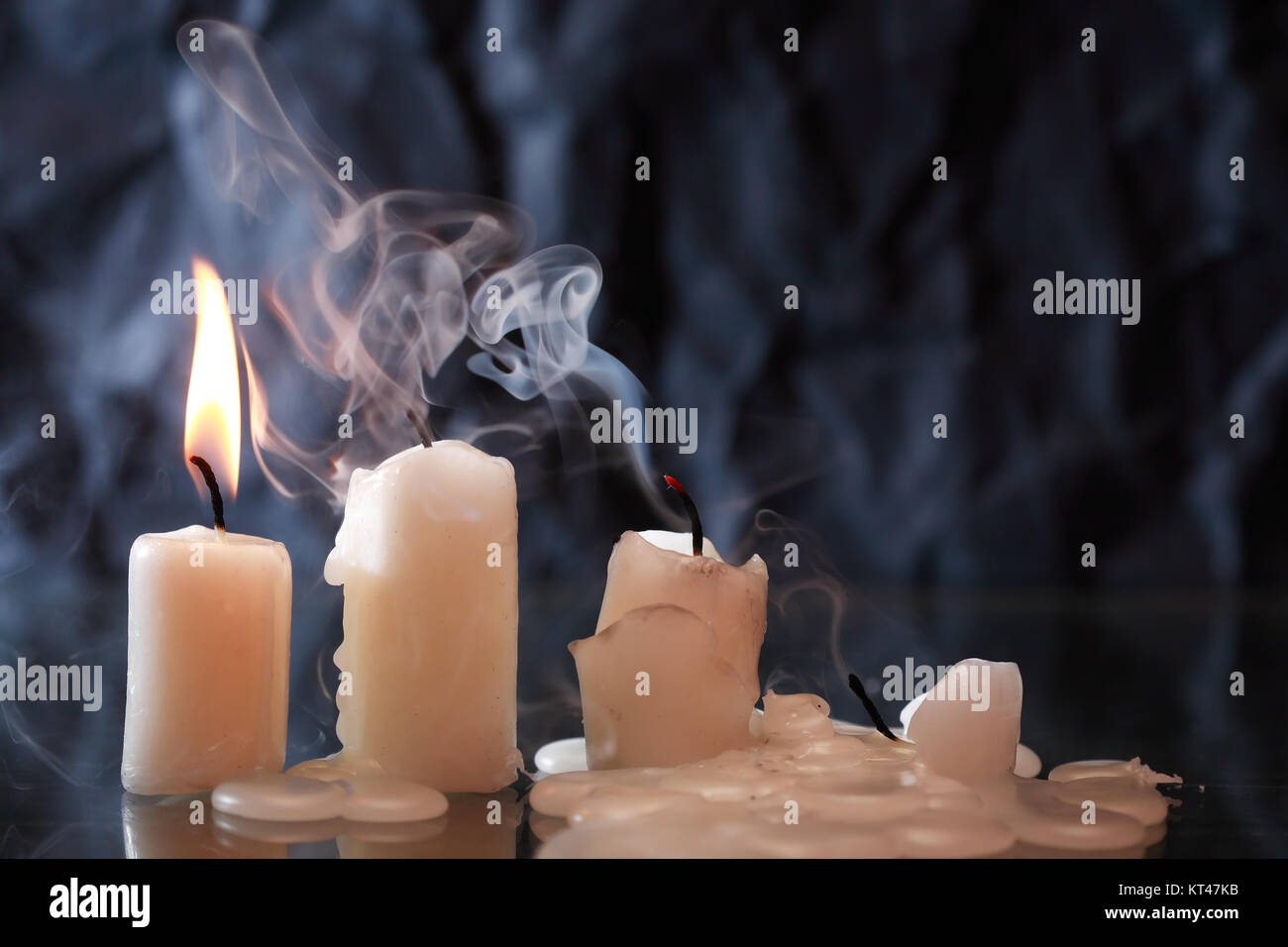 Candle light on a table, shining in the dark. Power outage, blackout  concept background Stock Photo - Alamy